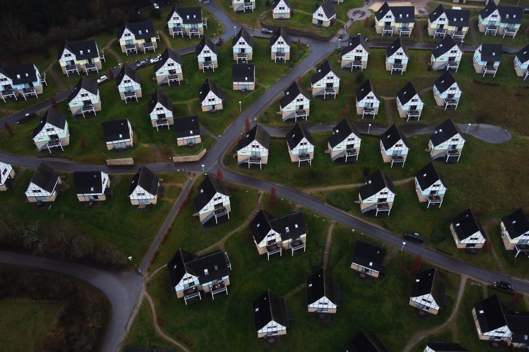 aerial-view-of-a-village-with-many-small-white-houses-i-6yf8yexey
